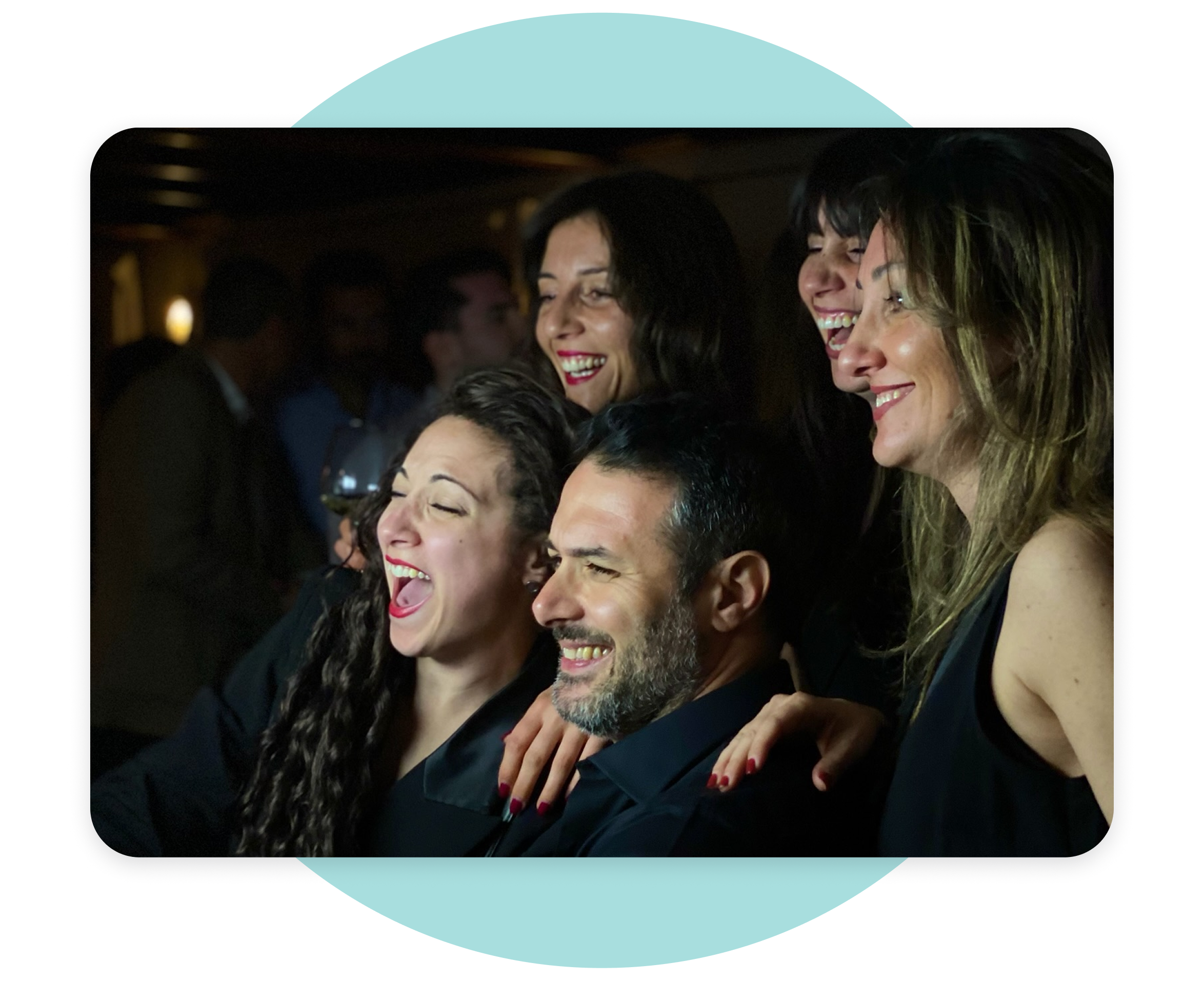 Photo of employees smiling and having fun taking a group photo